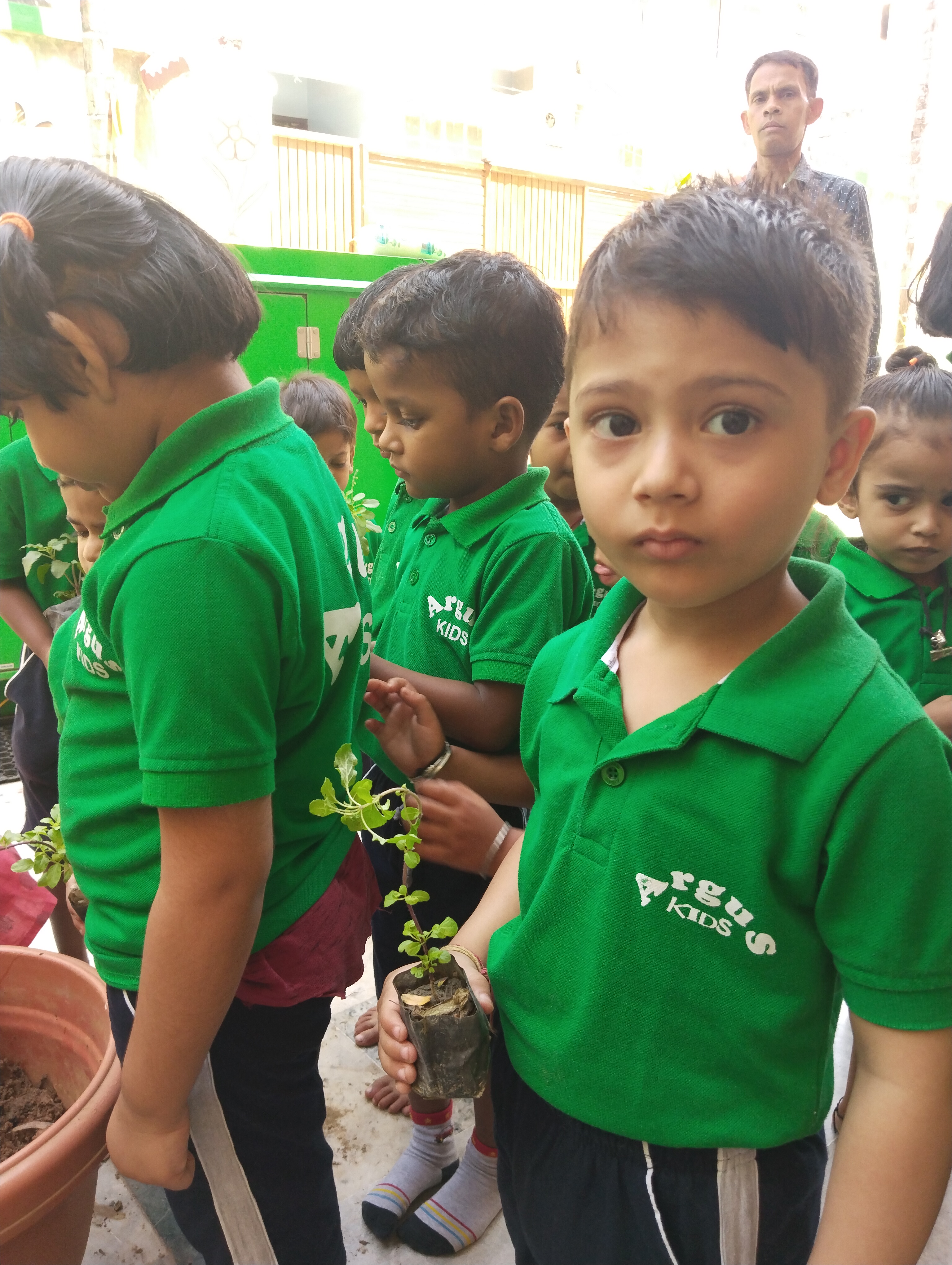 Kids doing plantation